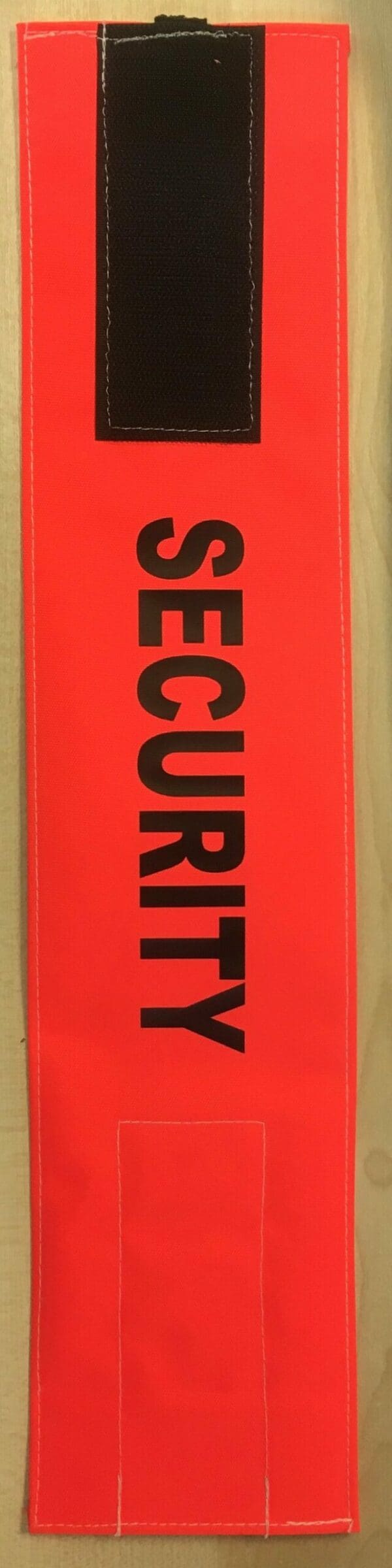 SECURITY PRINTED ARM BAND - ORANGE with BLACK Writing